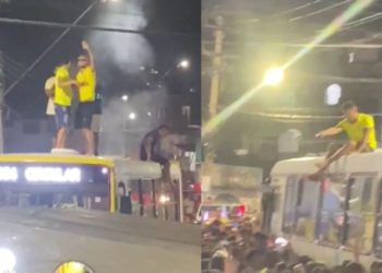 Mesmo sem gols do Brasil, torcedores festejam em cima de ônibus em Manaus