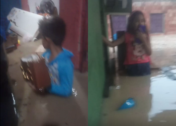 Vídeo: Com água ‘batendo no peito’, pai pede socorro para tirar filhos de dentro de casa