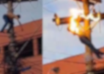 Um homem, aparentemente alcoolizado, subiu em um poste de energia, tentou se equilibrar sobre os fios de alta tensão até. Homem bêbado