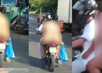 Onda de calor faz mulher andar de moto 'do jeito que veio ao mundo' na avenida Grande Circular, em Manaus