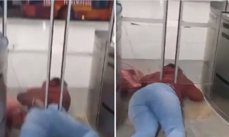 Uma mulher tentou passar por debaixo de uma catraca em uma estação de ônibus e acabou ficando presa. Vídeo: