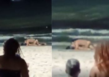Sem vergonha, casal ignora público e se satisfaz em praia - VÍDEO