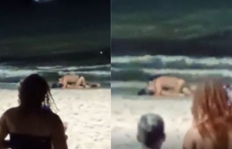Sem vergonha, casal ignora público e se satisfaz em praia - VÍDEO