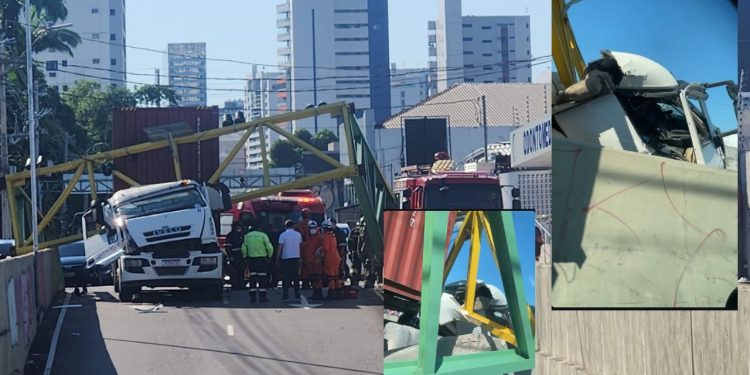 Um motorista ficou preso nas ferragens de uma carreta, na manhã desta quarta-feira (26),  após colidir. Vídeos: