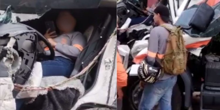 Uma motorista ficou com as pernas presas às ferragens da cabine do caminhão que dirigia após colidir com. Acidente entre