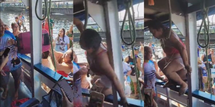 “Eu paguei, eu vou, p0rr4!”: Com sangue nos olhos, torcedora do Garantido entra à força no barco rumo a Parintins