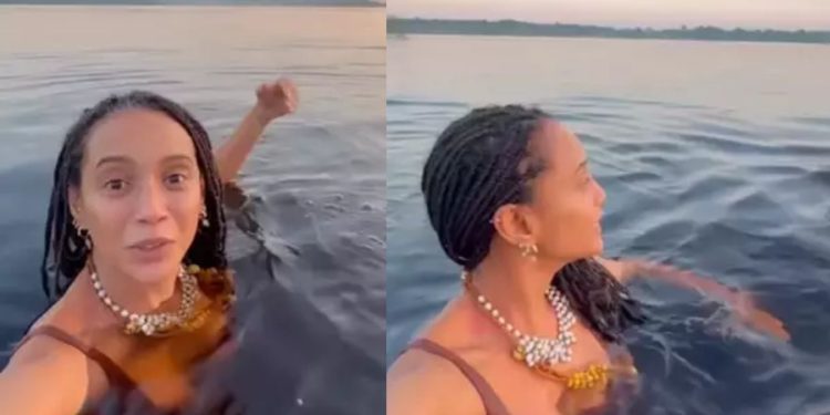 Taís Araújo e Lázaro Ramos mergulham com botos no Rio Amazonas