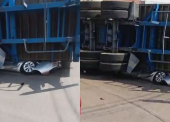 Urgente: Carreta tomba sobre carro na zona sul de Manaus