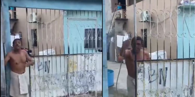 Vídeo: Morador se irrita com buzinada e joga água em entregadora no Grande Vitória. Vídeo: Morador se irrita com buzinada e joga água.