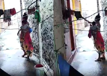 Câmera registra mulher com bebê que fica furtando roupas de varal em Manaus; veja