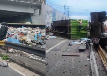 Motorista foge após tombar carreta com entulhos na Avenida das Flores
